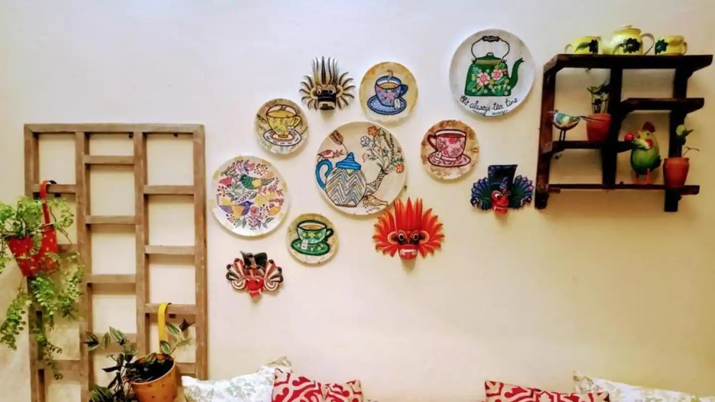 Paint the plates, dishes; stick them to your wall